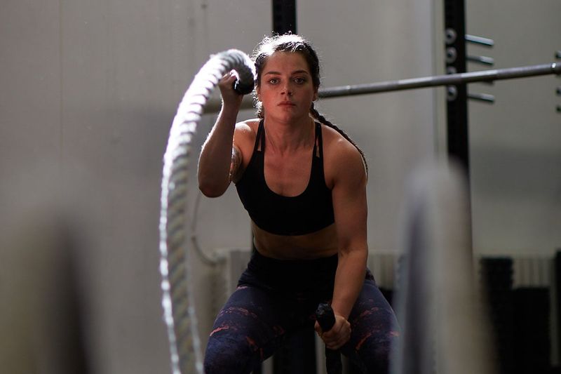 Battle ropes training during body transformation session at Elevate LDN