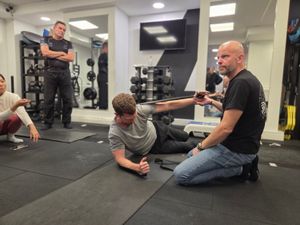 Prone resistance band drill during DNS Exercise Part II at Elevate LDN